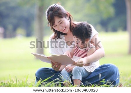 Parents and children reading books