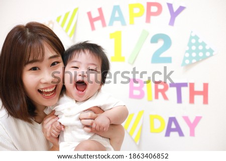 Smile parent and child half-birthday image