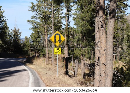 Road Sharp Turn Sign In Nature