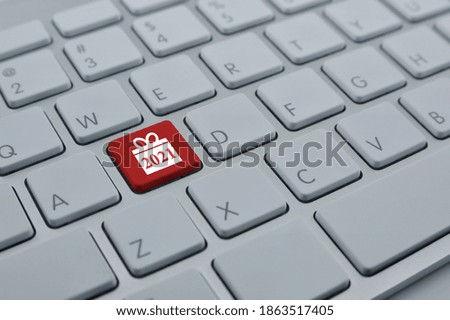 Gift box happy new year 2021 flat icon on modern computer keyboard button, Business shop online concept
