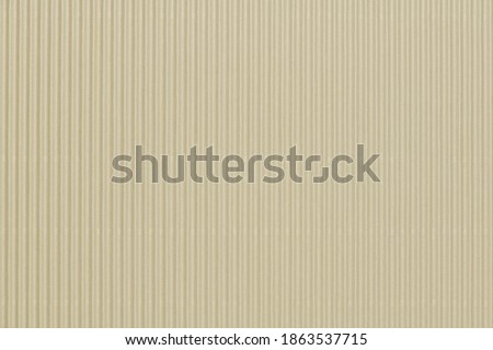 Beige corrugated paper wallpaper background