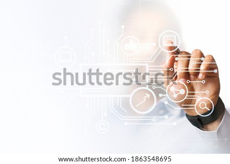 Businessman pointing at his presentation on the futuristic digital screen
