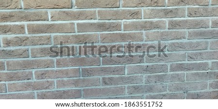 Brown brick wall background. High quality photo