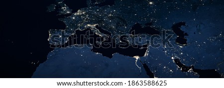 Europe, Mediterranean and Middle East with city lights at night, panoramic view from space. Detail of World dark map in global satellite picture, photo. Elements of this image furnished by NASA.
