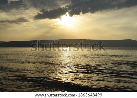 Sunset over the Sea of Galilee and Golan Heights. High quality photo.