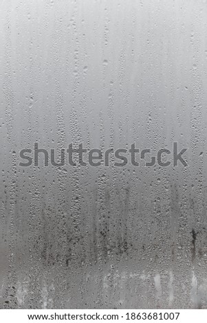 Dripping Condensation, Water Drops Background Rain drop Condensation Texture. Close up for misted glass with droplets of water draining down  Royalty-Free Stock Photo #1863681007