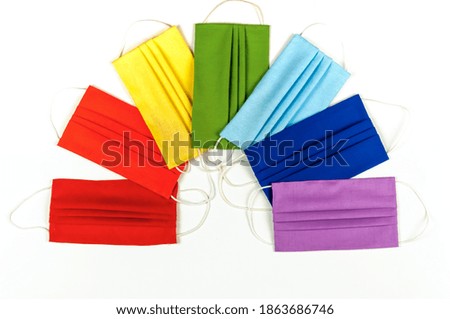 Rainbow of medical masks.Seven color masks.