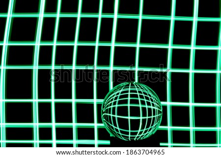 Long exposure photograph of neon green colour in a checkered crisscross parallel lines pattern against a black background with reflections in a glass orb. Light painting photography.