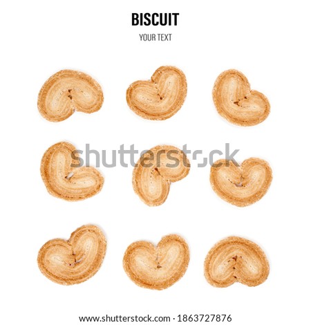 Puff pastry cookies. Fresh puff pastry cookies in the shape of a heart. Classic French pastries. Pig ear, elephant ear cookies, French hearts. Heart shaped puff pastry isolated on white background