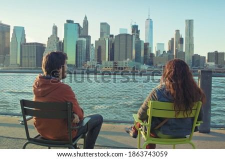 A loving couple enjoying of Manhattan view , New York City, USA.