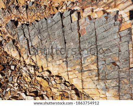 Delaminating Ancient Rock Formation Texture