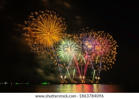 Multi colored fireworks at night