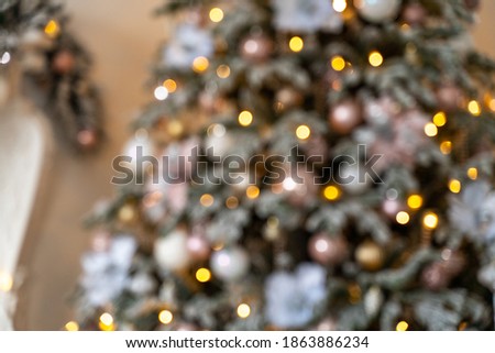 Decorated Christmas tree in blur, background for Christmas pictures. The concept of Christmas holidays, holidays. High quality photo