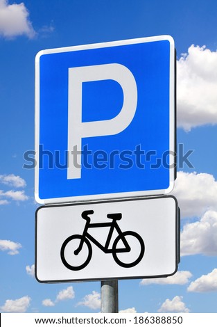Road sign parking for bicycles on a blue sky background.