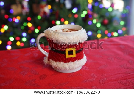 Santa Claus Cup with Hot Chocolate and Marshmallows. A Christmas Gift left for Santa as a Special Treat. 