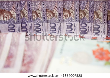 Malaysia currency of Malaysian ringgit banknotes .Paper money of ten, twenty, fifty and hundred  ringgit notes on closeup. Financial concept.