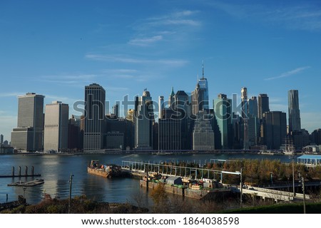 Lower Manhattan skyline panorama from Brooklyn Bridge Park