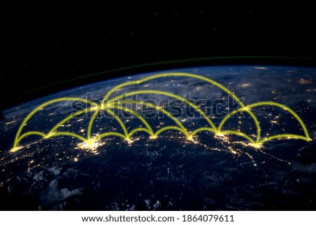 Glowing network line connected between some zone on earth at night. Concept about global connection such as communication, business, digital network, internet. Elements of this image furnished by NASA