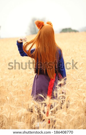 asian cosplay in wheat field