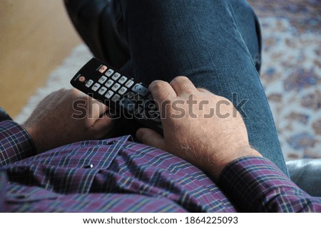 man with entertainment technology in the hand