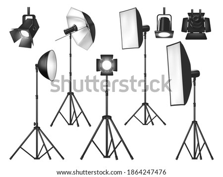 Photo studio lighting equipment and lights isolated vector objects. Realistic 3d spotlights and tripod stands with flash lamp, reflector and softbox, umbrella and floodlight, photographer lighting kit Royalty-Free Stock Photo #1864247476
