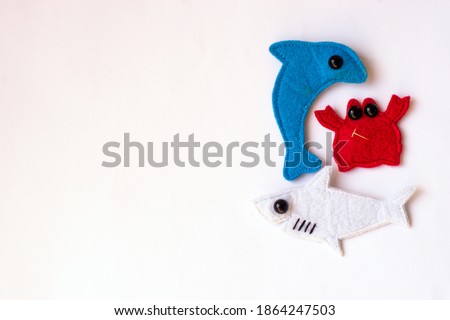 marine animals from fabric on a white background. top view