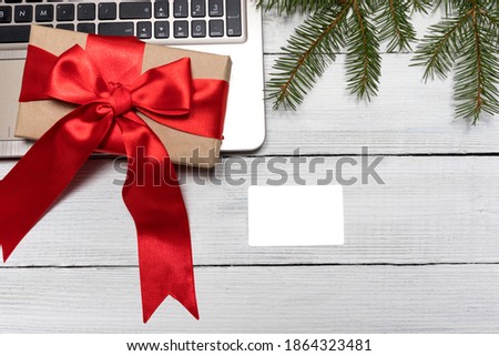 computer, gift and credit card with place for text on white background Black friday. Sale tag