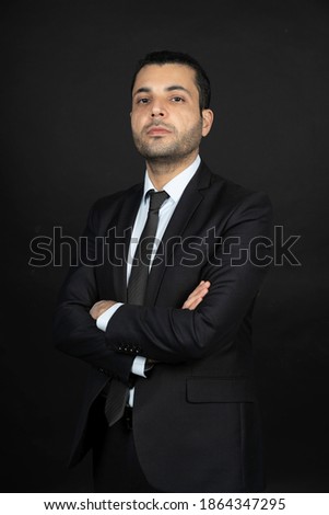 businessman with his arms tied