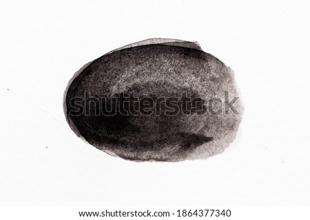 Black color watercolor drawing in round brush or banner shape on white paper background