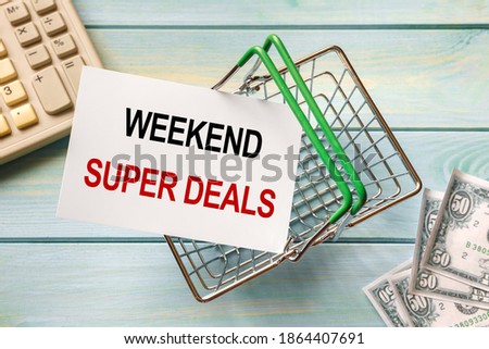 Shopping basket and text Weekend Super Deals on white paper note list