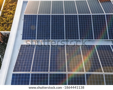 Photovoltaic panel for renewable energy at sunrise time. Sunflair solar panel  power station top shot