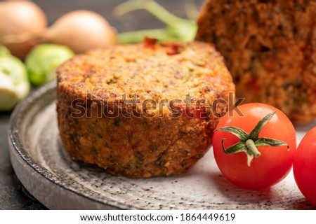 Fresh veggie burgers made from vegetables, beans and legumes, tasty vegan food close up