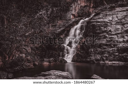 Moody brown image of waterfall,image is taken on longe exposuer.