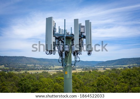 Aerial photograph of the communications bundle and structure on a telecommunications tower Royalty-Free Stock Photo #1864522033