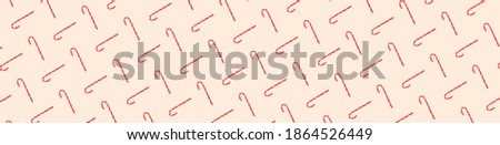 Traditional Christmas candy cane on withe background