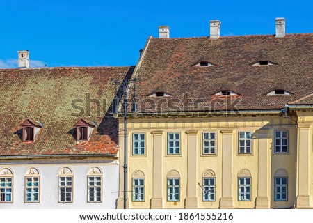 Roofs with windows like eyes, typical architecture of Sibiu, Transylvania, Romania. The eyes are Baroque-style ventilations from the 19th century.