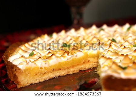 
Delicious and appetizing lemon tart with whipped cream