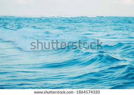 Beautiful panorama of splashing blue wave curl.