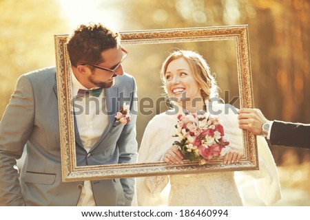 Happy groom and bride together. Couple on wedding day. Royalty-Free Stock Photo #186460994