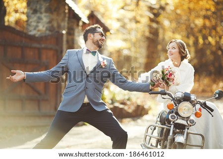 Happy groom and bride together. Couple on wedding day. Royalty-Free Stock Photo #186461012