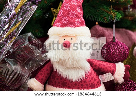 A soft Santa Claus toy in supermarket