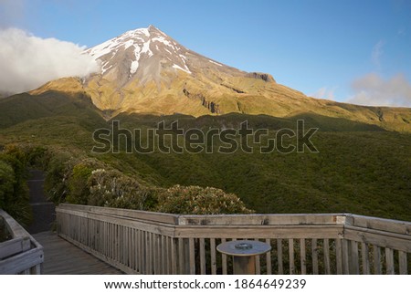Mount Taranaki (Mount Egmont) volcano in morning sunshine - New Zealand