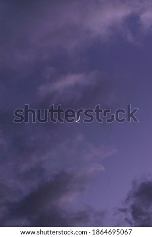 purple nightfall with a beautiful moon, dramatic sky