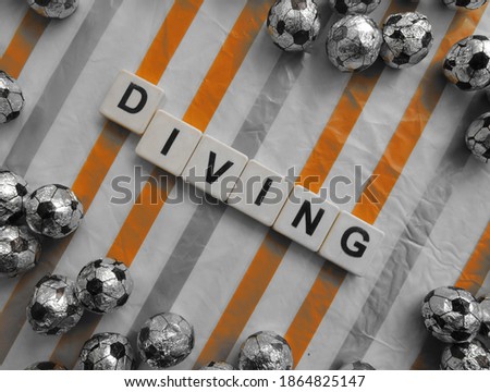 Diving, word cube with background.