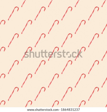 Red striped candy canes of Santa are stacked - seamless pattern, ornament. Christmas, new year, winter holiday atmosphere 