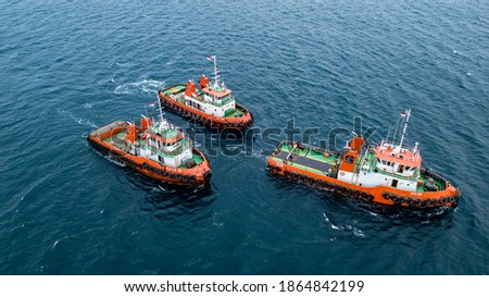 Coal Oil Transportation Tug Barge Tanker sea river Mother Vessel seatruck trucking Royalty-Free Stock Photo #1864842199