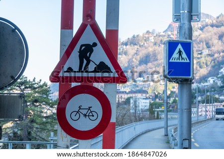 Sign road work and No bicycle sign in Lausanne, Switzerland.