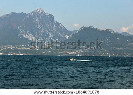 A boat sailing on lake Garda