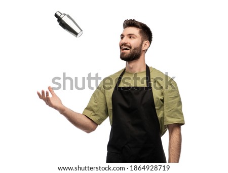alcohol drinks, people and job concept - happy smiling barman with shaker preparing cocktail over white background Royalty-Free Stock Photo #1864928719
