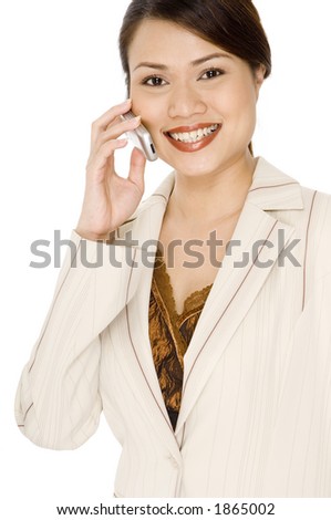 A smiling young asian woman in business suit on white background
